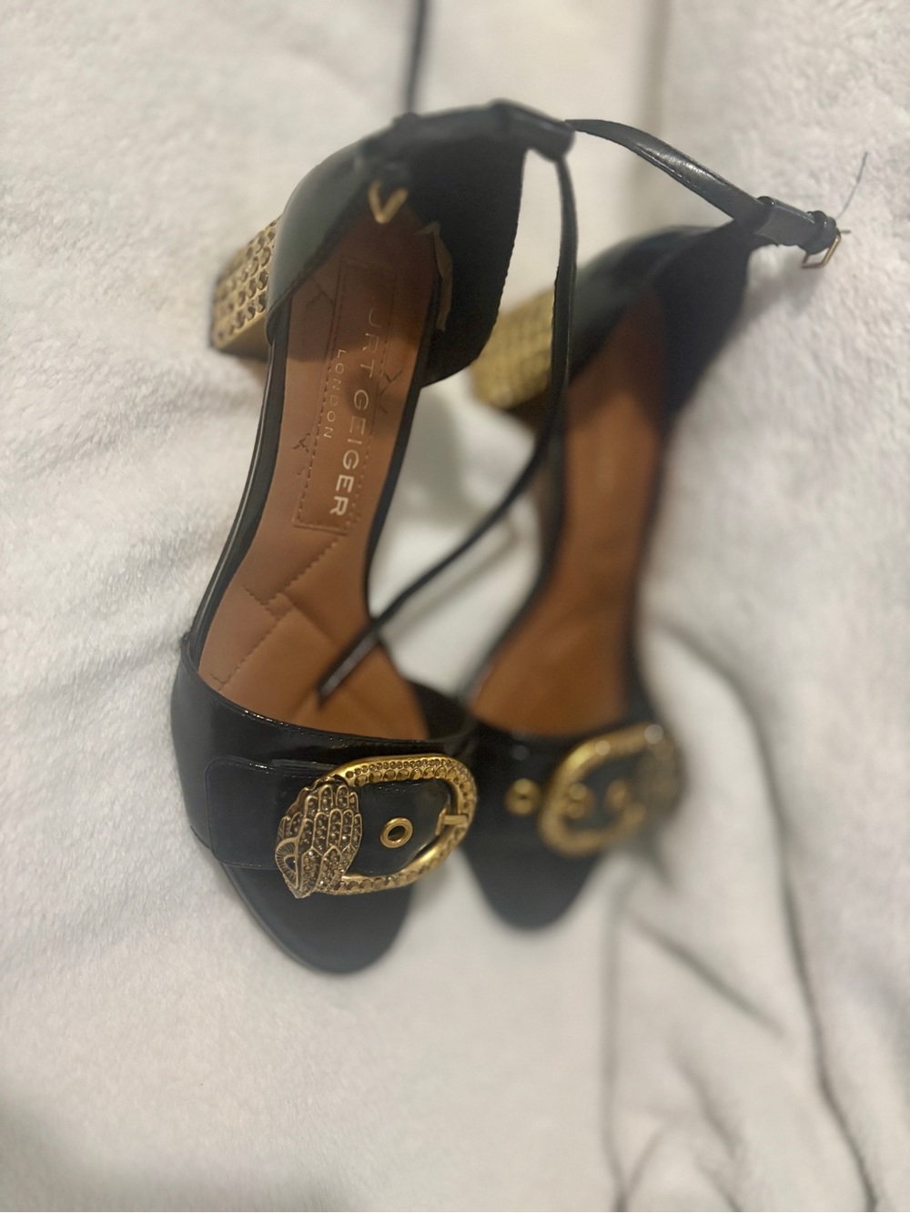 Stuart Weitzman Black Leather Open-Toe Heels with Gold Buckle Detail